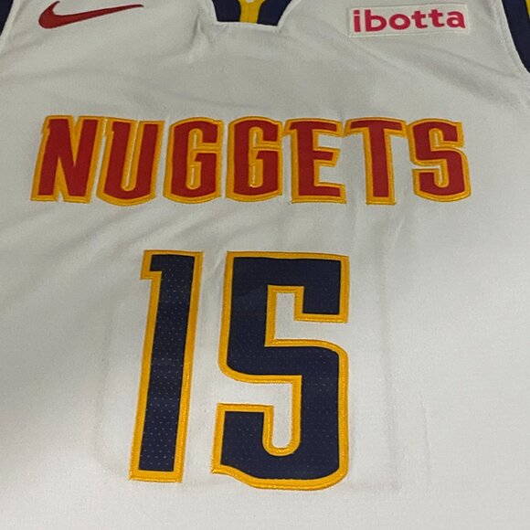 Denver Nuggets Player Jokić Wearing A White Jersey With The Number 15 - Picture 4 of 7